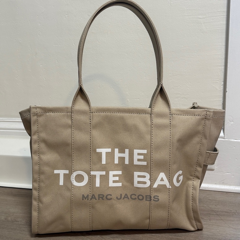 Marc Jacobs Beige Tote with White Lettering. Medium size